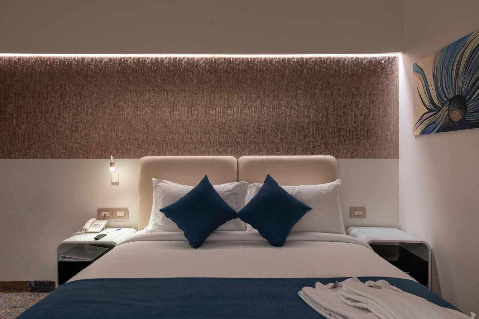 Mirage Hotel & Conference Center Alexandria Exterior foto A bedroom at the hotel