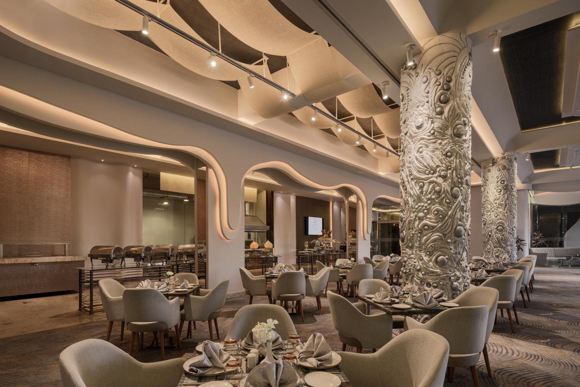 Mirage Hotel & Conference Center Alexandria Exterior foto The restaurant