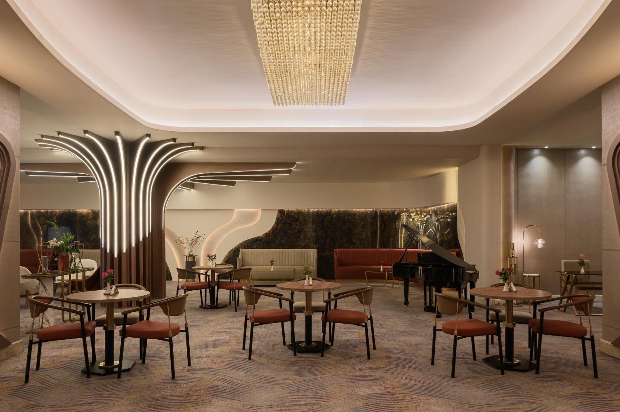 Mirage Hotel & Conference Center Alexandria Exterior foto The interior of the restaurant